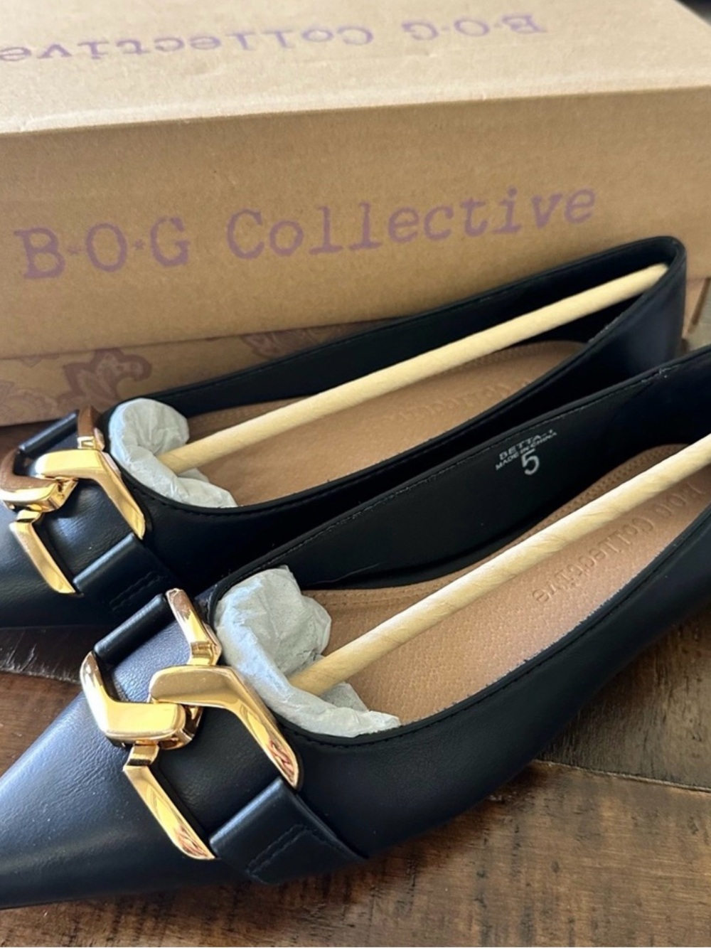 Black Pointed-Toe Flats with Gold Accent